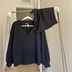 Travis Mathew black shorts